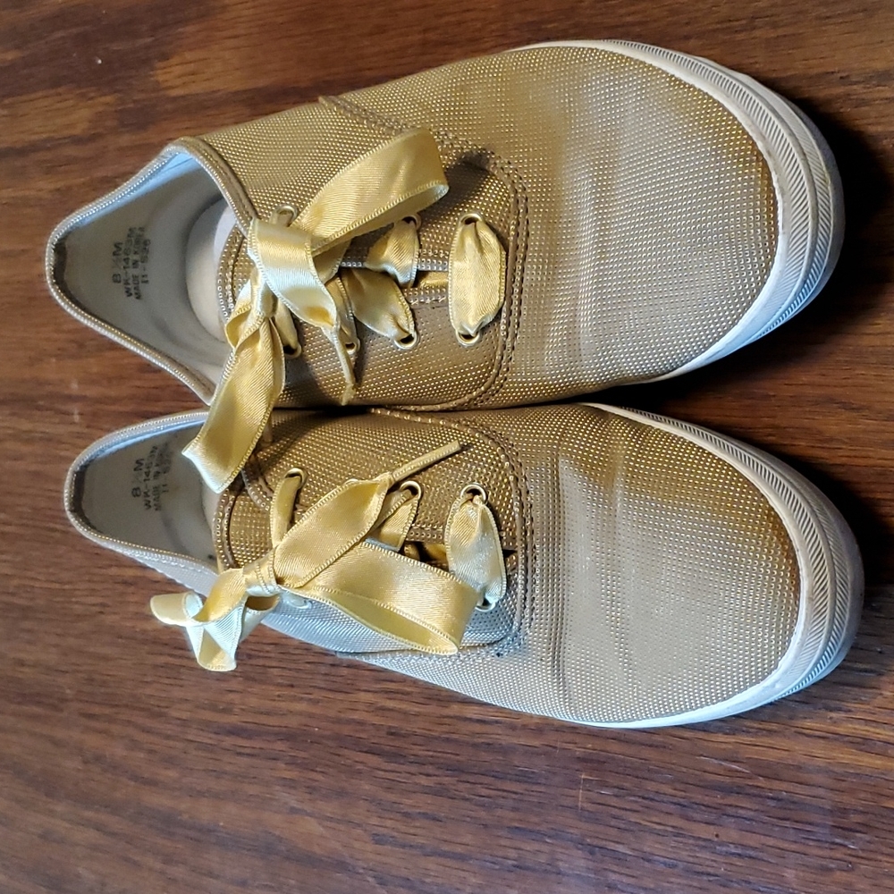 Keds gold shoes with ribbons
